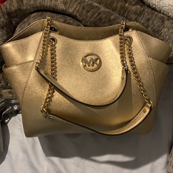 Michael Kors Handbags - Gold Michael Kors purse.